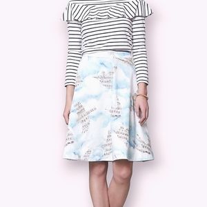 MAEVE | Women's blue and tan songbird cloud print A-line circle skirt.